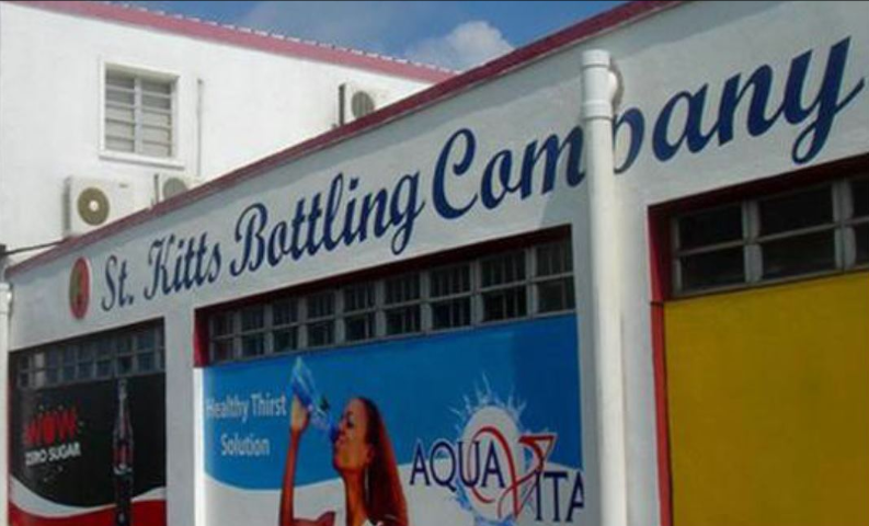 The front of a St. Kitts Bottling Company building.