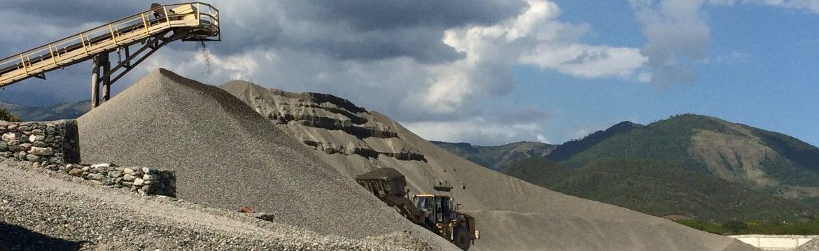 Jamaica Aggregates, rock and gravel pit with machinery and conveyor belt.