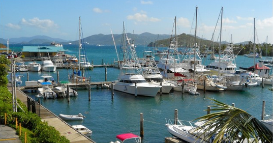 A view of large boats and sailboats docked in St. Thomas