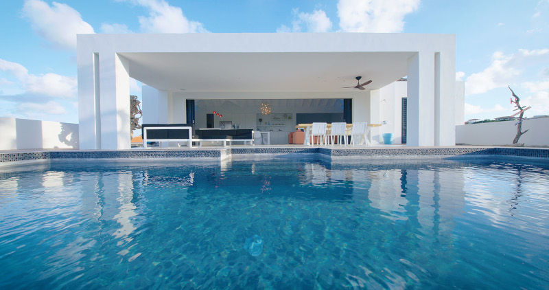Blue Bay Curacao Golf & Beach Resort private villas poolside.