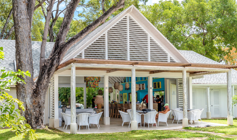 GSA Architecture & Interior Design example of work, beach club outdoor open air building with chairs and a bar.