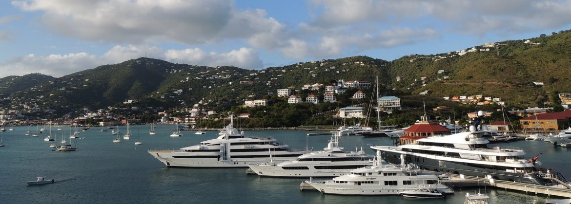 JPK Developement of the US Virgin Islands. View of St Thomas Island showing boats and homes in the background on hills.