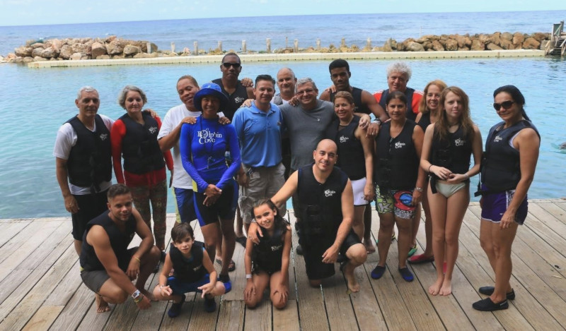 Dolphin Cove Jamaica group photo of the Cuban Ambassador visiting.